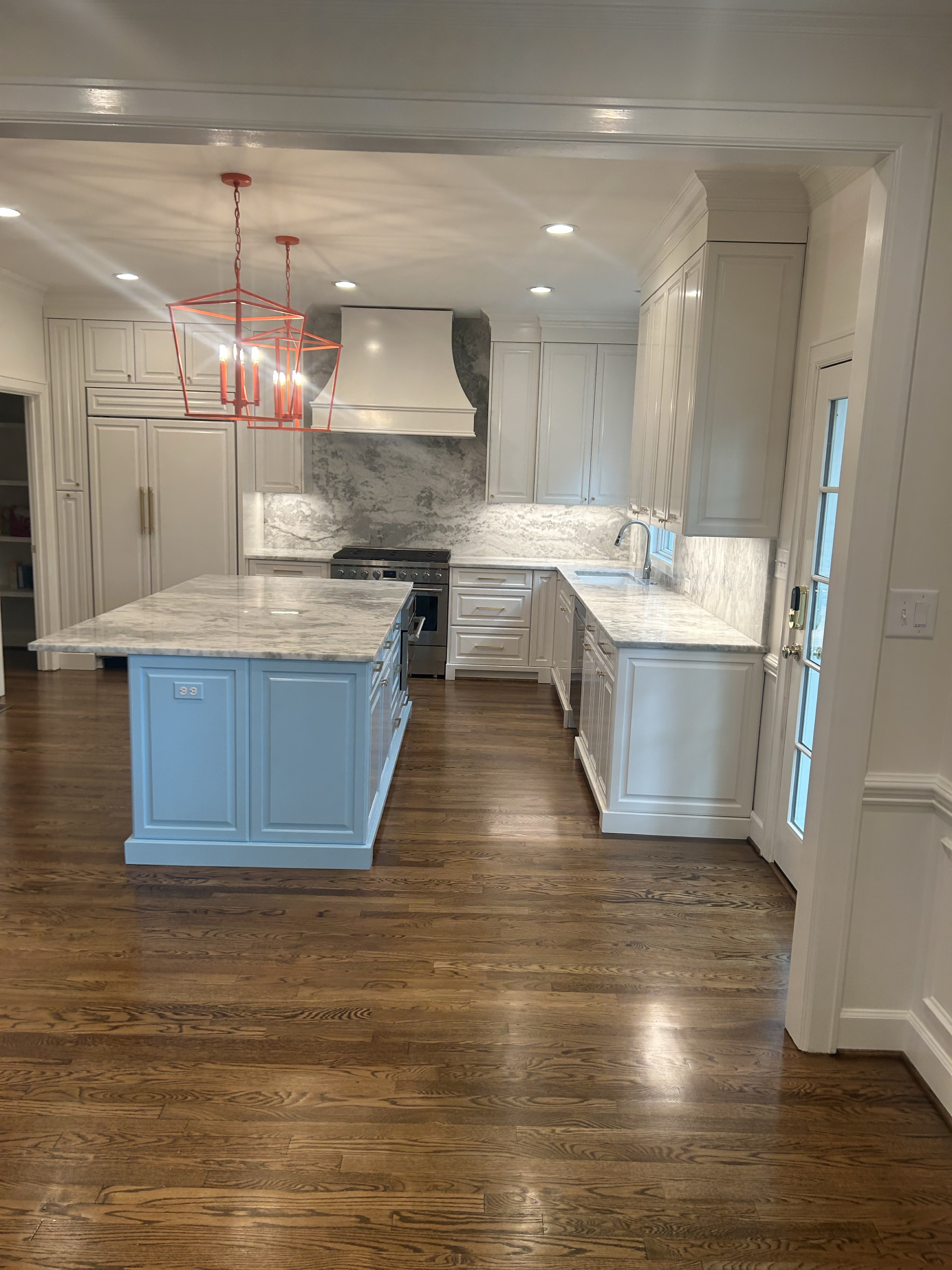 Outdoor covered porch with shiplap, TV and fireplace